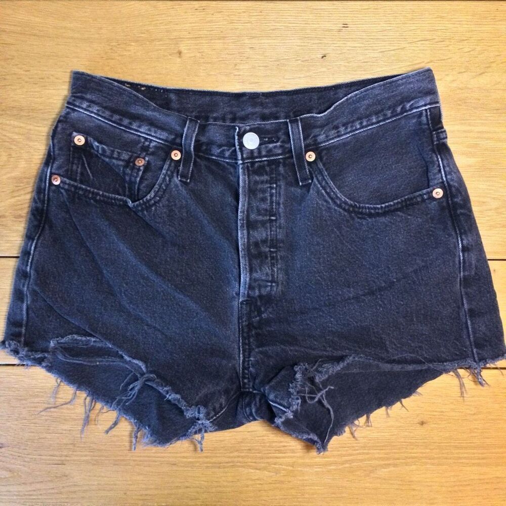 Levi’s 501 raw hem black buttonfly shorts 27